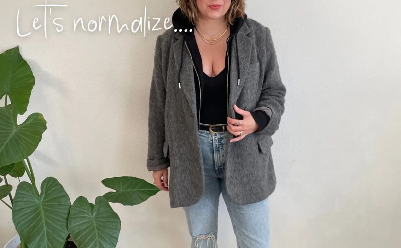 A Gray Coat and Black Hoodie with Light Denim